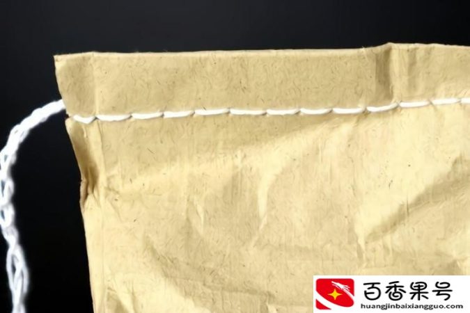 怎样拆米袋封口线